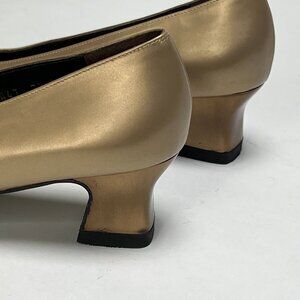 Salvatore Ferragamo gold metallic pumps with 2 inch heel, Size 7.5 AAA